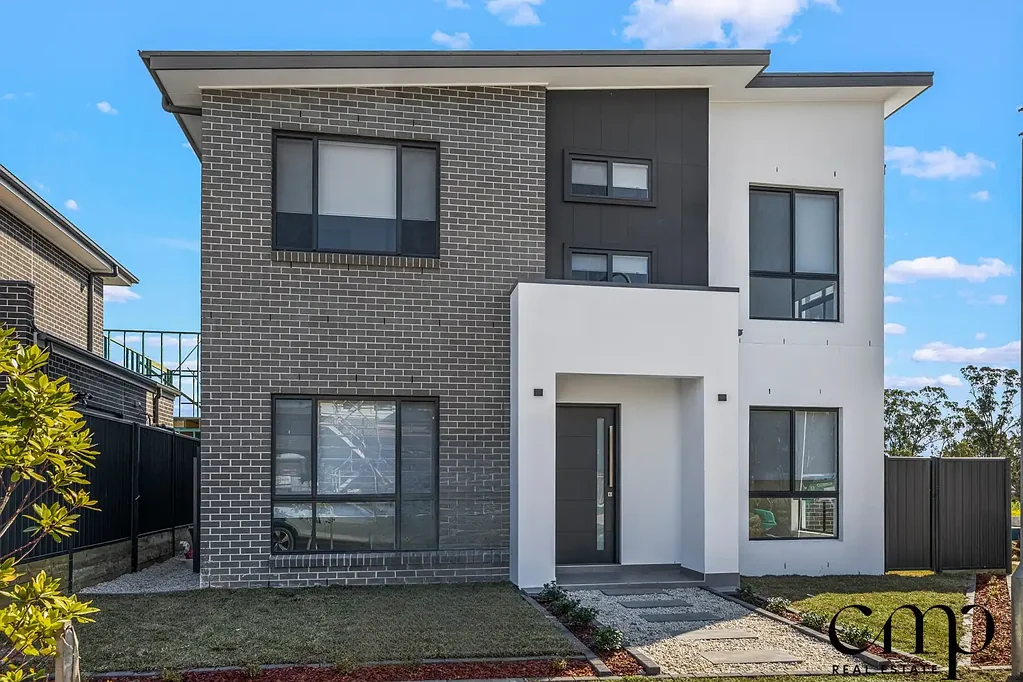 Modern, Five Bedroom Home!