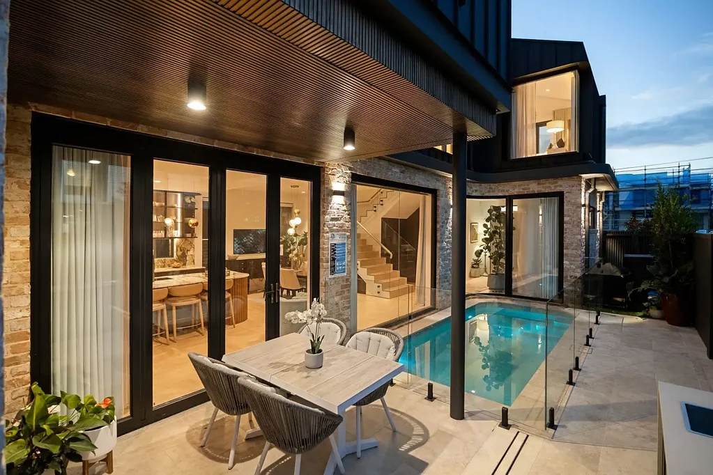 Full-brick family oasis of architectural design and craftsmanship