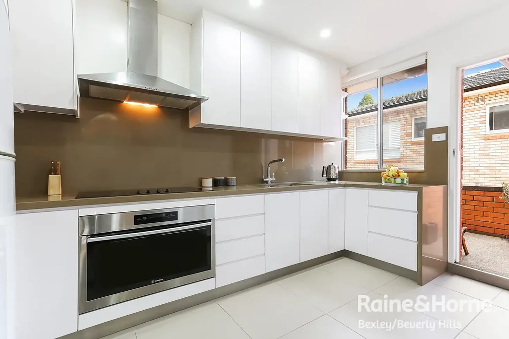 Renovated & Light-Filled, Lifestyle Convenience with Dual Balconies