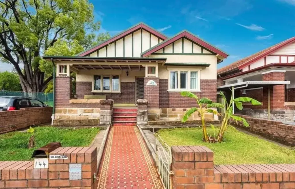Modern Ashfield Family Home: Renovated Kitchen, Side Access & 15-Minute Stroll to Station