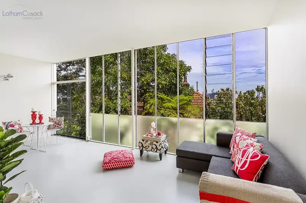 **Open for Inspection, 10.00-10.30am, Saturday**
Striking Harbour Views with Industrial Style Interiors