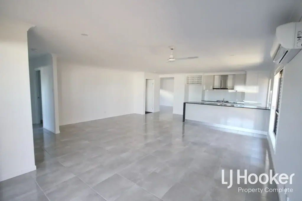 Low Maintenance Family Home With 2 Living Areas!