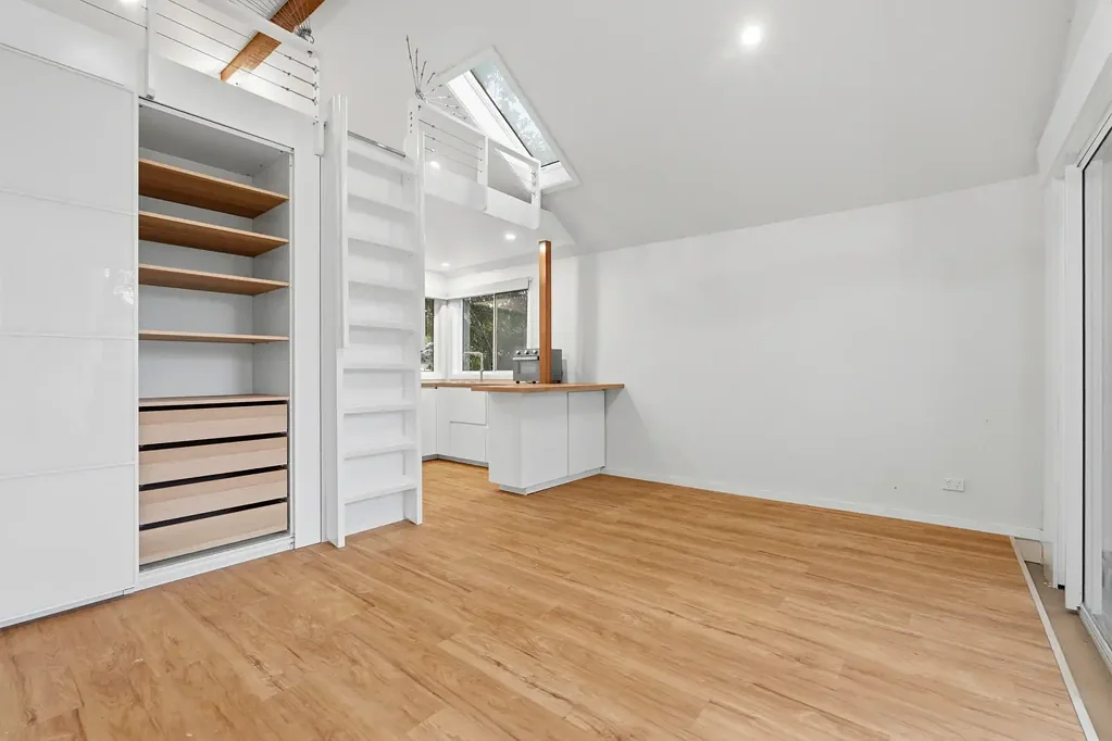 Stylish Coastal Studio with Clever Storage Throughout