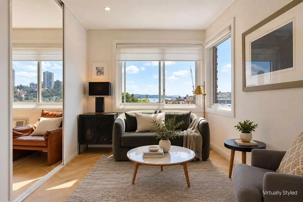REFRESHED THREE-BEDROOM APARTMENT WITH PARKING AND HARBOUR VIEWS