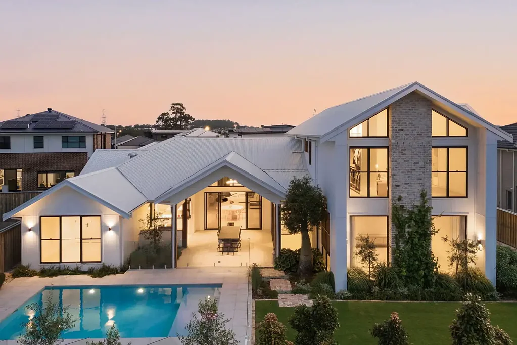 Gledswood Hills 4chambre An architectural retreat where natural light, warmth and craftsmanship create an undeniable sense of home. Video on slide 2.