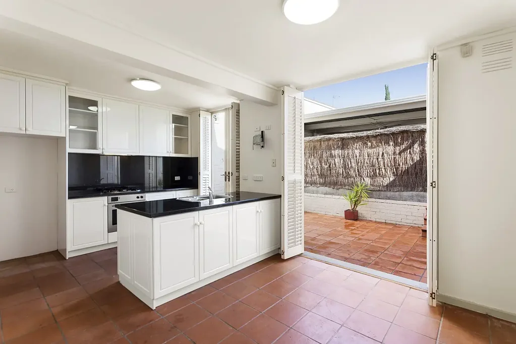 Townhouse Offering Sunlit Living in Prestigious Toorak