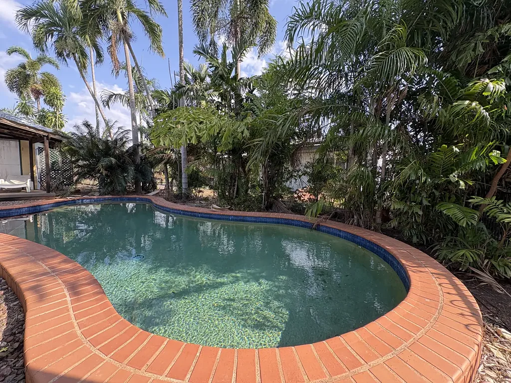 TROPICAL LIVING AT ITS BEST - SPACIOUS FAMILY HOME WITH RESORT STYLE POOL!