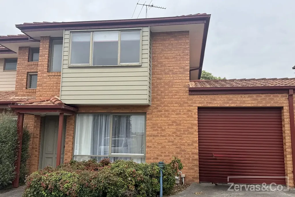 TOWNHOUSE IN CLAYTON'S BEST LOCATION