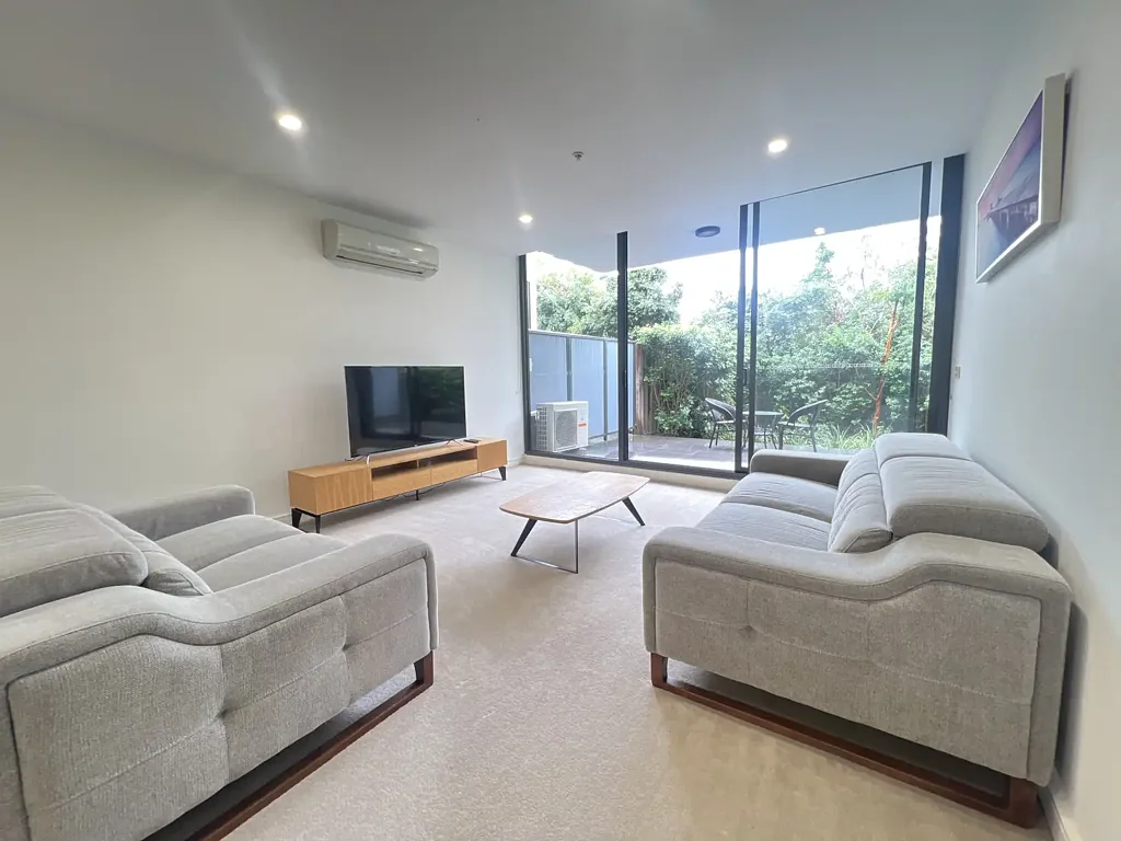 Modern two bedroom Fully Furnished Apartment with a private courtyard Ready to Move in Now!