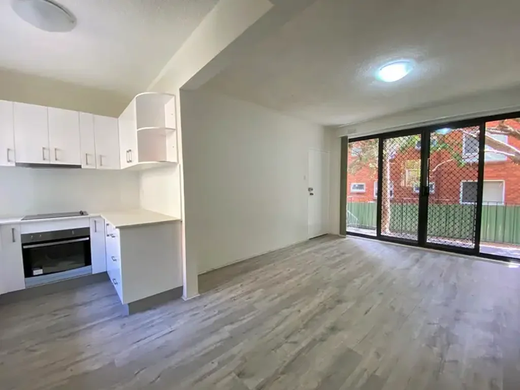 RENOVATED TWO BEDROOM APARTMENT BALCONY + GARAGE