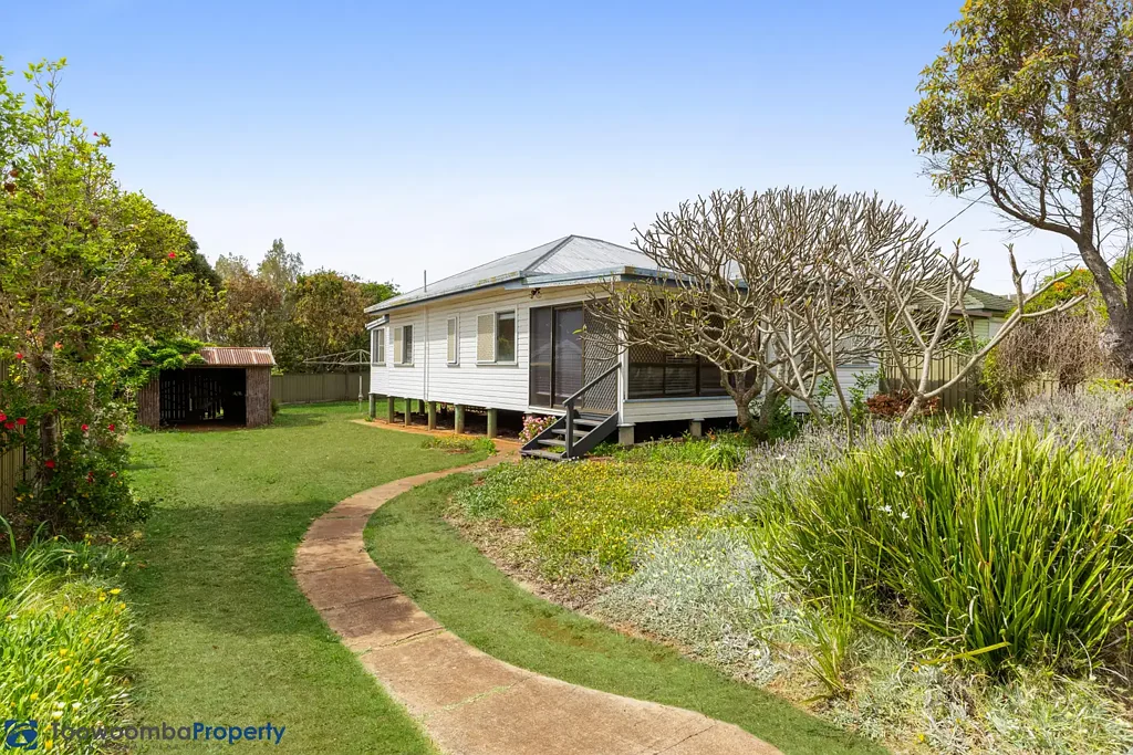 Charming Weatherboard Home in Peaceful Harristown!