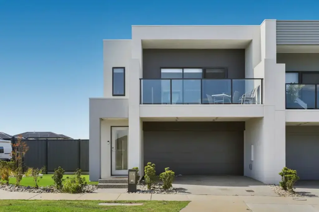 Stunning corner townhouse with spacious yard!!