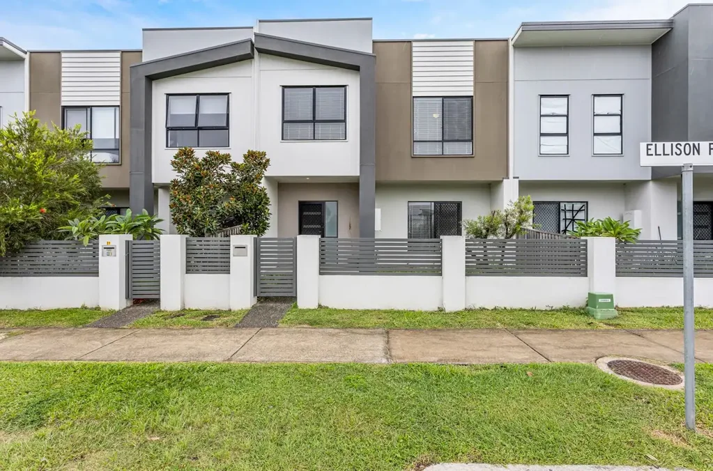 Enjoy the open plan 4 bedroom townhouse with private grassed courtyard