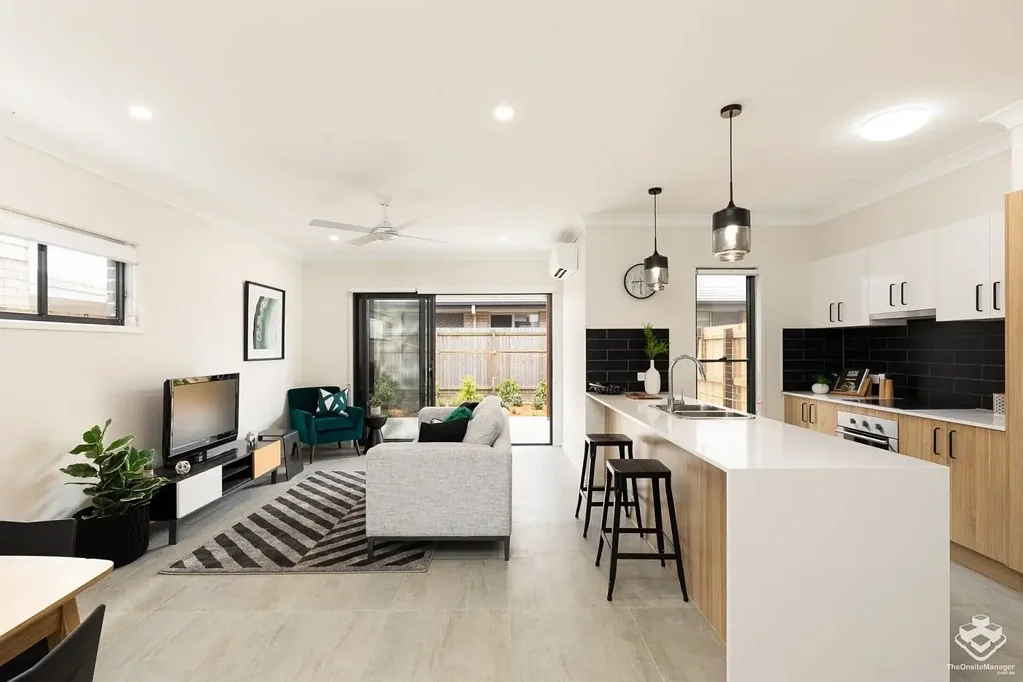 FOUR BEDROOM 2 BATHROOM TOWNHOUSE WITH SINGLE LOCK UP GARAGE & COVERED CARPORT