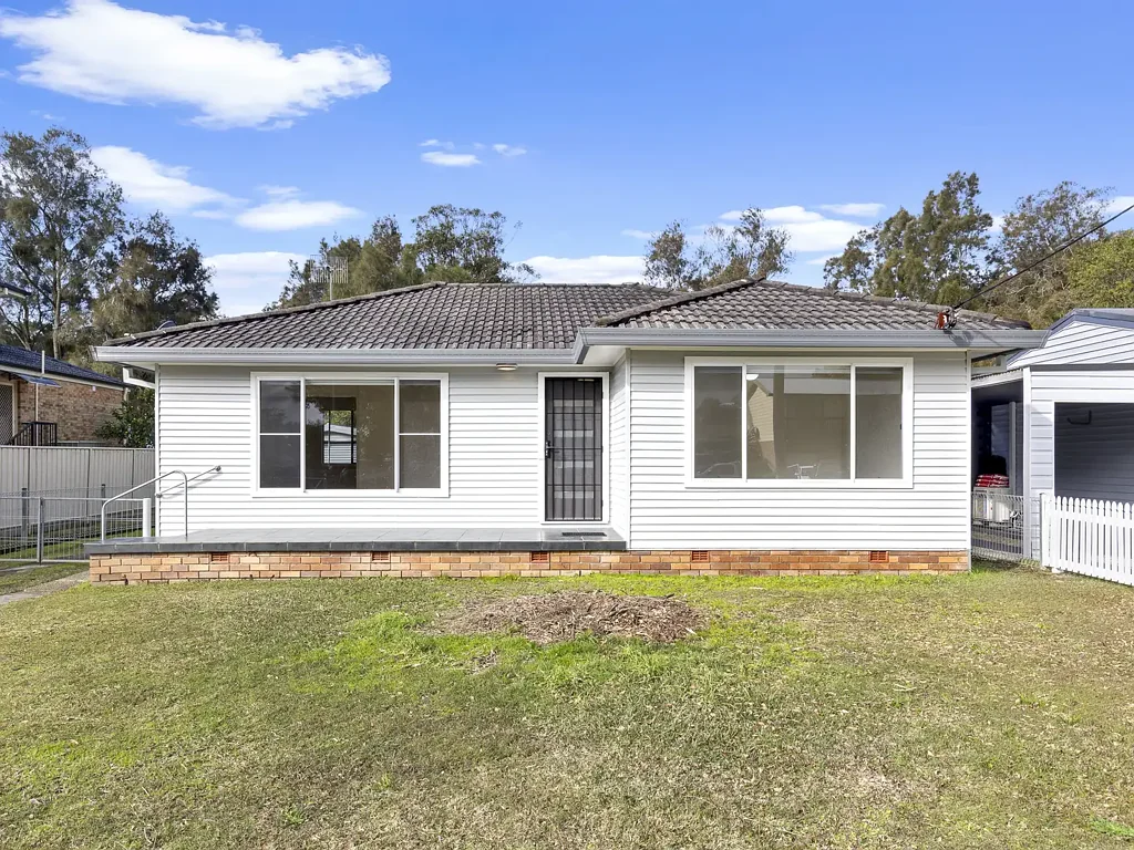 Freshly Updated Two-Bedroom Home with Lake Views!