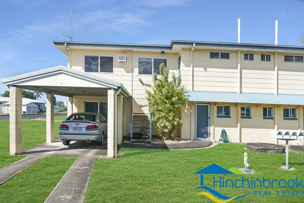 Two bedroom unit with air conditioning & 2-Bay carport