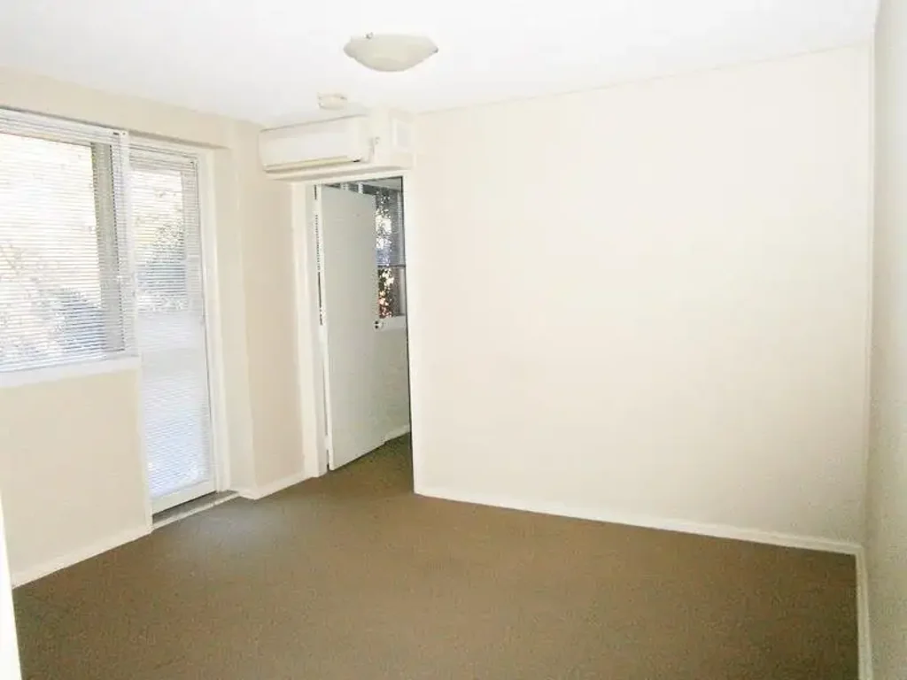 DELIGHTFUL ONE BEDROOM UNIT WITH CAR-SPACE
