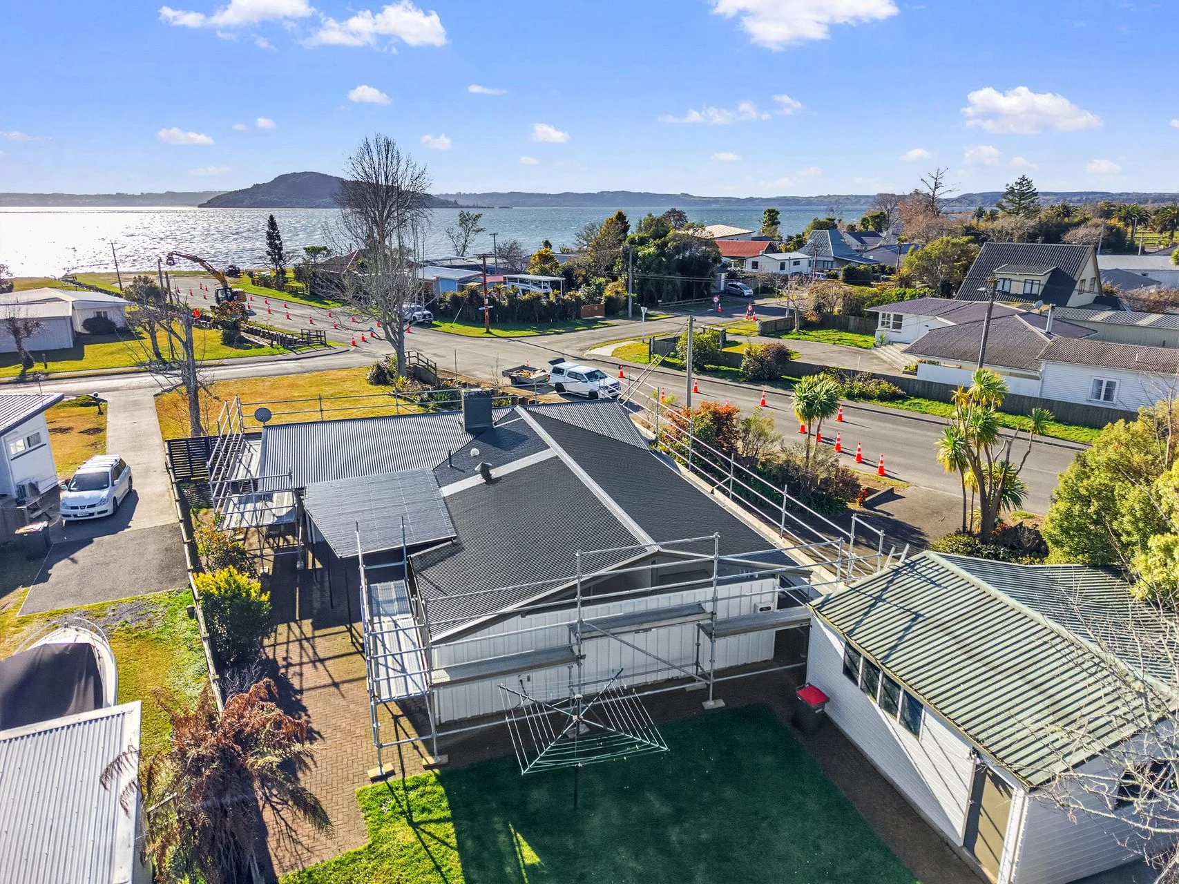 Hannahs Bay 3 Bedroom New Roof, Lake Views & Quarter-Acre Potential!