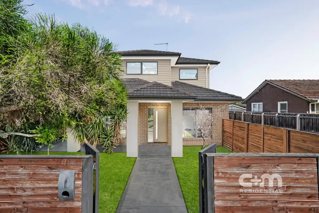 1 down, 2 up! 3-bedroom street facing beauty..