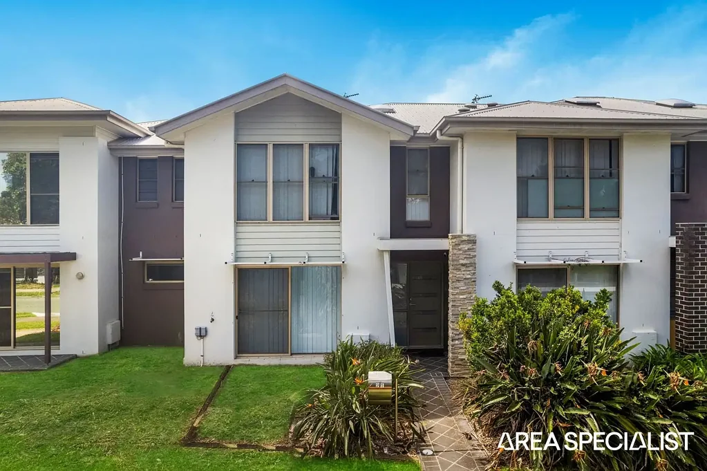 Spacious townhouse with 2 Living areas and a Private Courtyard