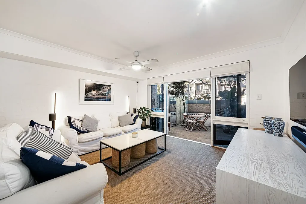 Dual Level Two Bedroom Townhouse with Secure Parking + Storage - Offered unfurnished