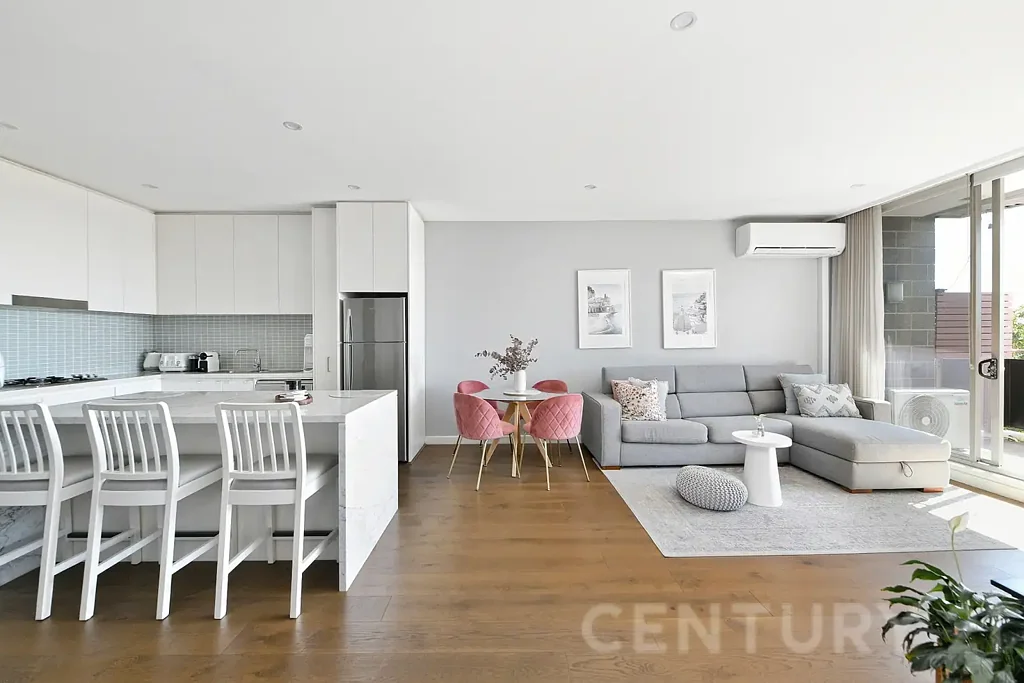Elevated Luxury with Soaring Ceilings & Water Views