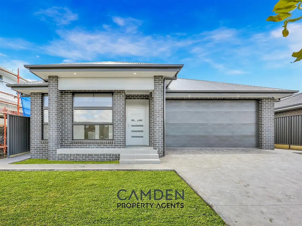 NEAR NEW STUNNING HOME!