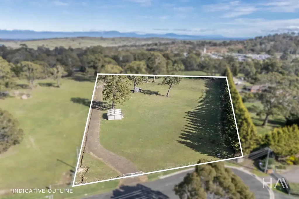 Devon Hills Private Acreage with Convenience and Potential