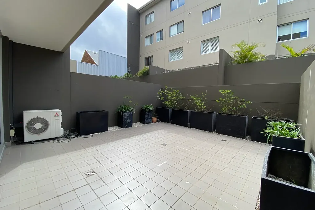 One of a Kind - Split Level 105m2 One Bedroom with Large Courtyard - Opposite Woolworths