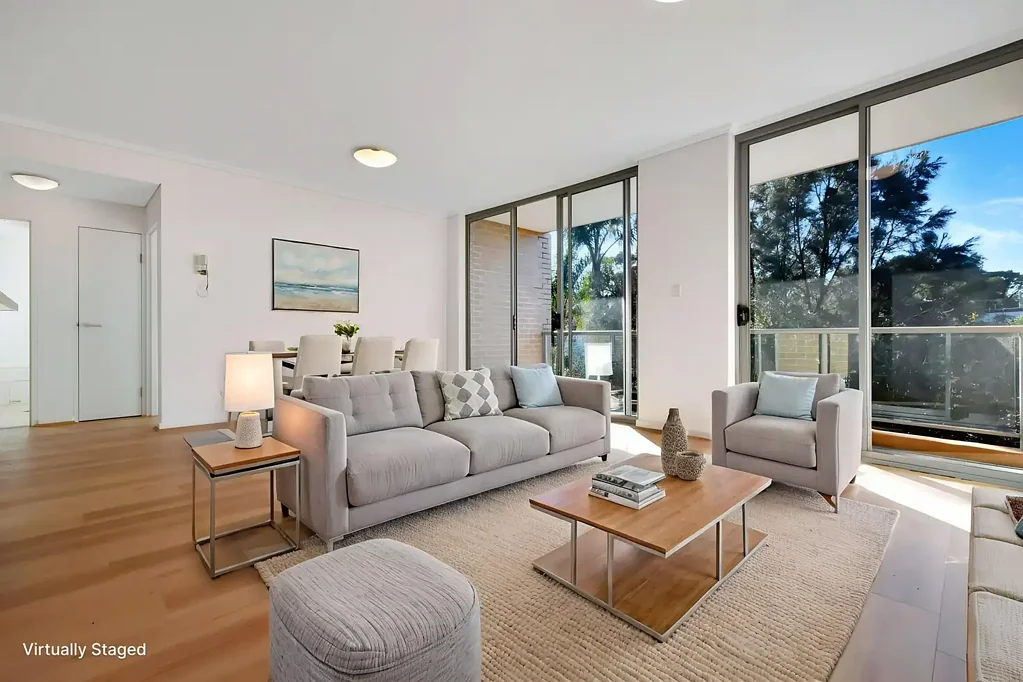REFRESHED TOP FLOOR TWO BEDROOM APARTMENT WITH OCEAN GLIMPSE