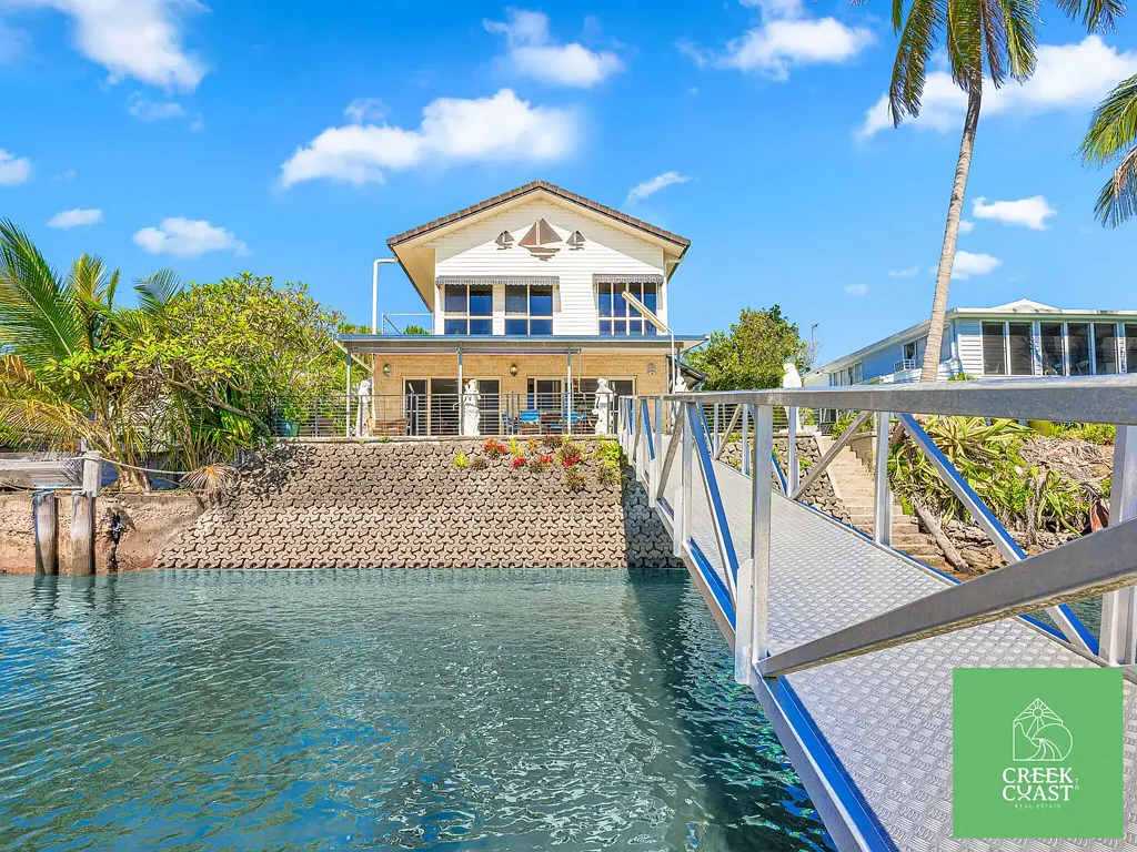 Tin Can Bay 4બેડરૂમ Once in a Lifetime Waterfront – Prestige, Position & Unmatched Value