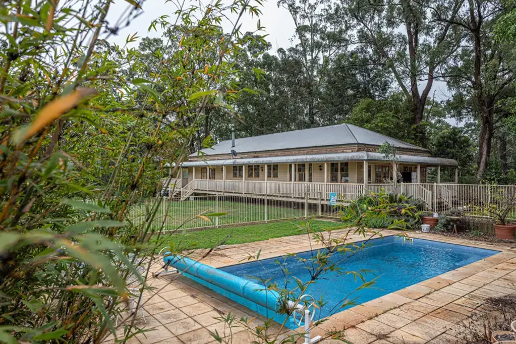 Rare Cabarlah Acreage with Stables, Arena, Pool and Huge Family Home.