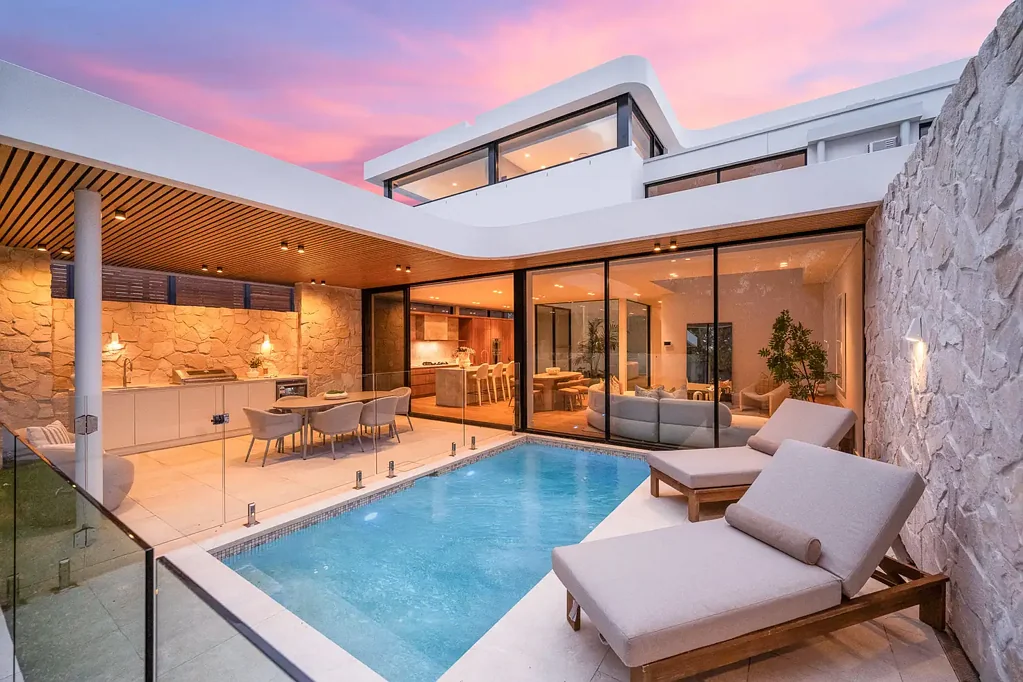 A Rare Bayside Masterpiece with an Exclusive Private 6-Car Garage