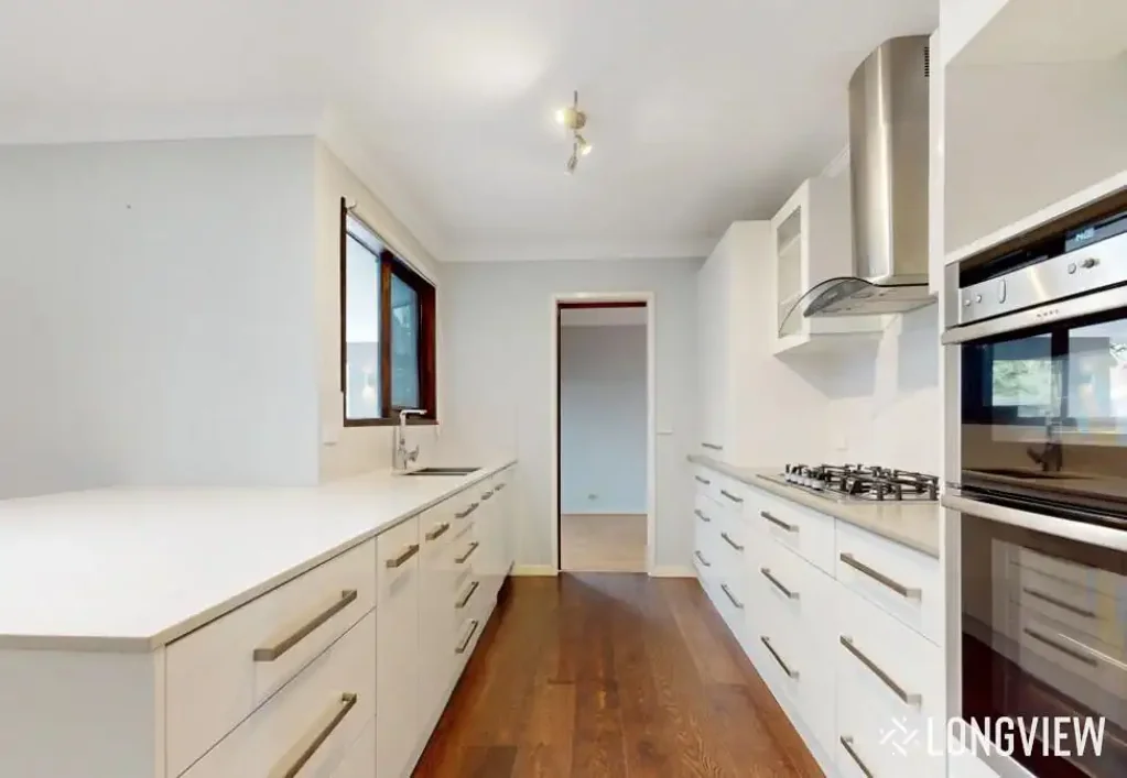 Spacious Four-Bedroom Family Home with Multiple Living Areas and Large Backyard