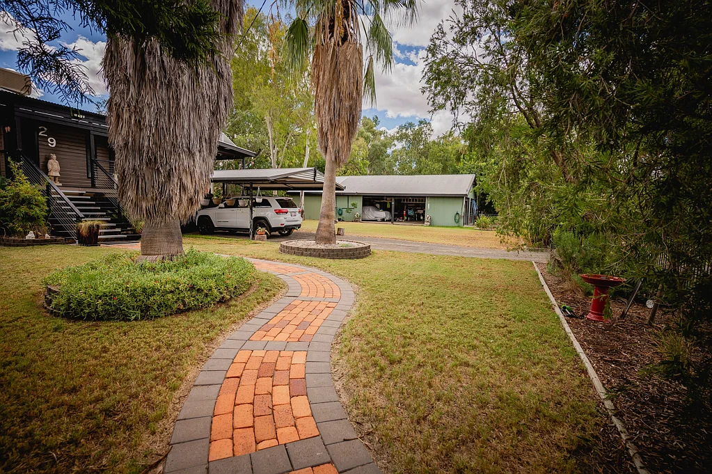 Roma 4 Bedroom Family Home on a Spacious 2023sqm Block surrounded by mature, tranquil gardens