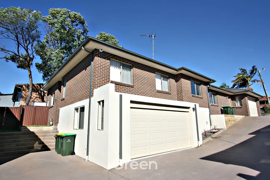 Elegantly Designed 4-Bedroom Villa-Style Home! Set back from Victoria Road!