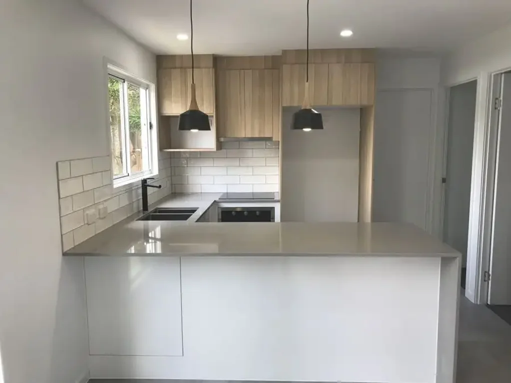 Modern Two Bedroom Home Within Walking Distance to Shops and Beach