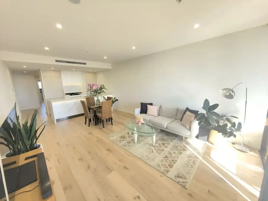 Fully Furnished Near New 2-Bedroom Plus Study Apartment With District & Water Views.