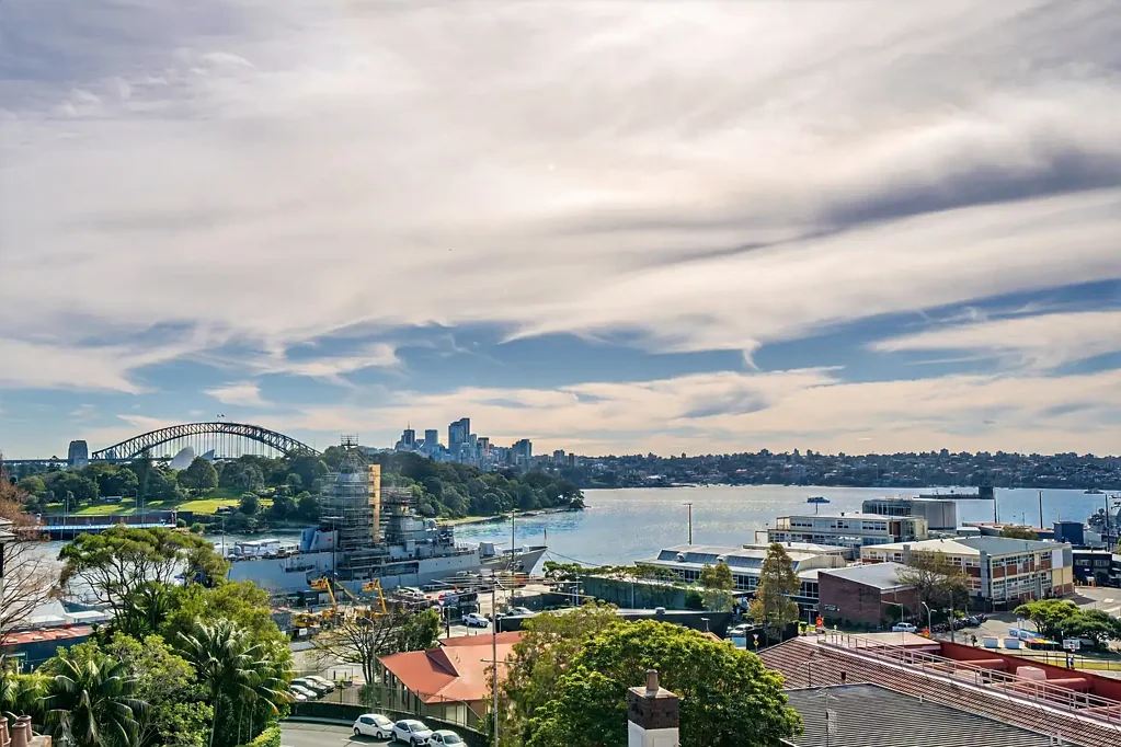 Spectacular Harbour Bridge and water views from this Furnished Studio Apartment With Balcony. Good size kitchen is a bonus!