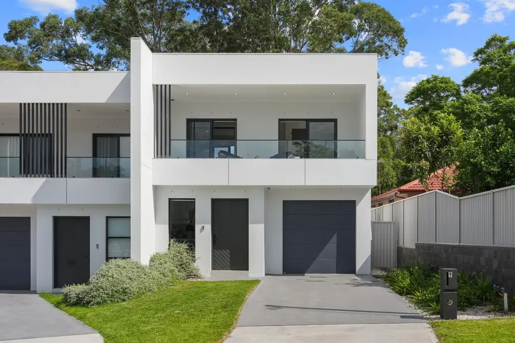 Impressive Full Brick Duplex Offering Modern Luxury