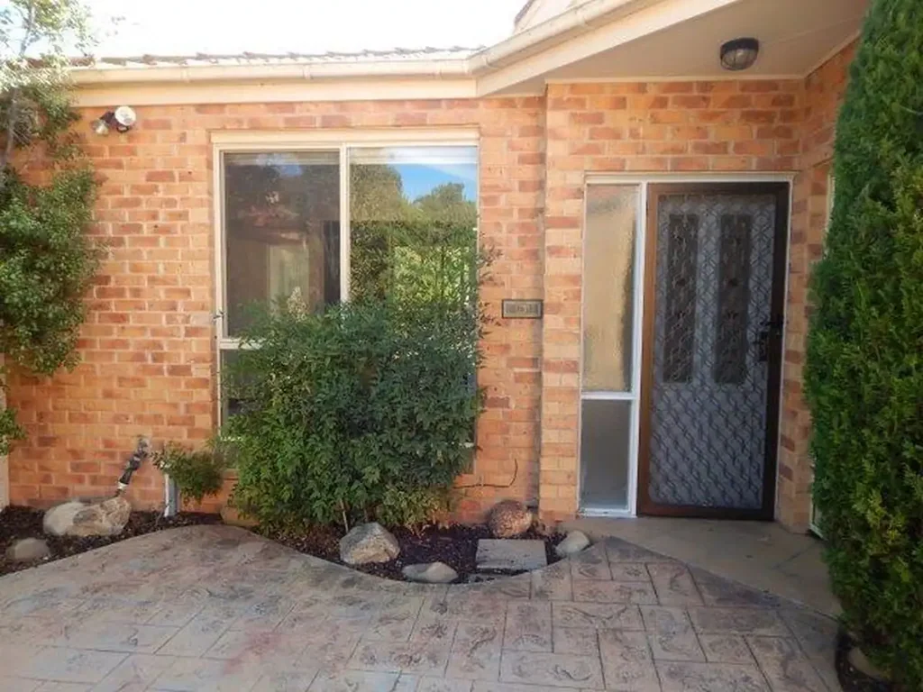 A HIDDEN HAVEN OF SINGLE LEVEL LIVING