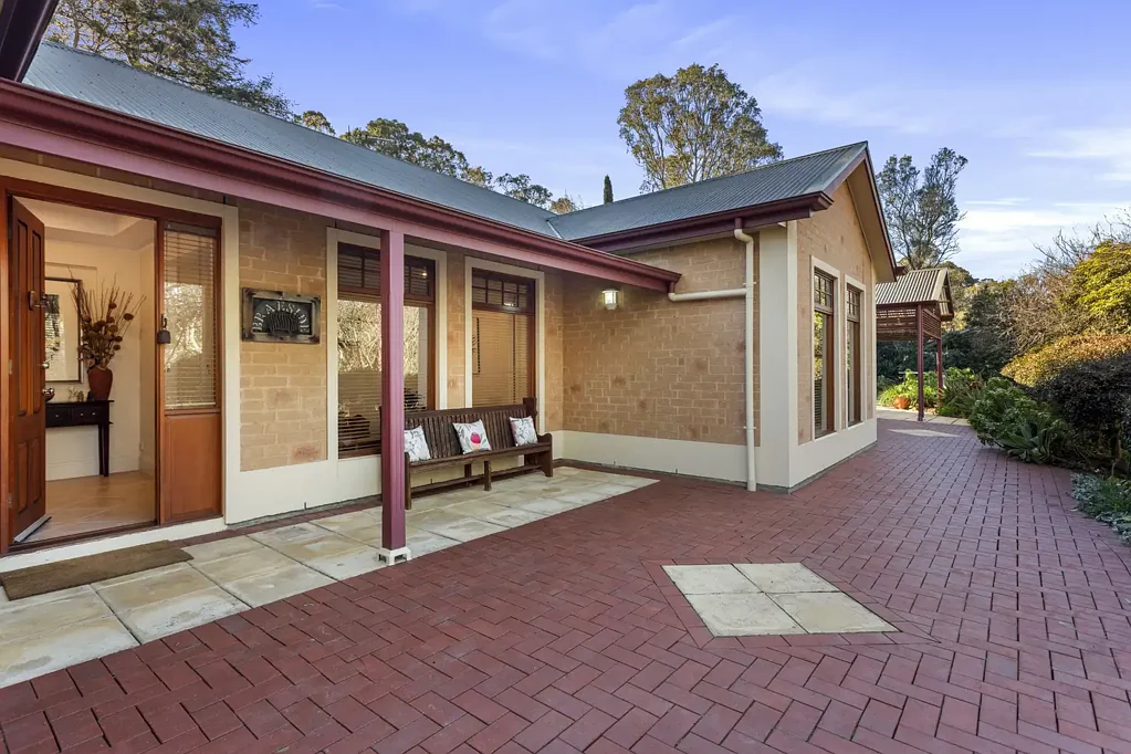 Blackwood 4 Bedroom At the end of a long agapanthus-lined driveway, 'Braeside' reveals an established oasis of impressive scale, just moments from Blackwood.