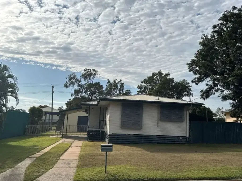 Centrally located 4 bedroom home with a huge shed
