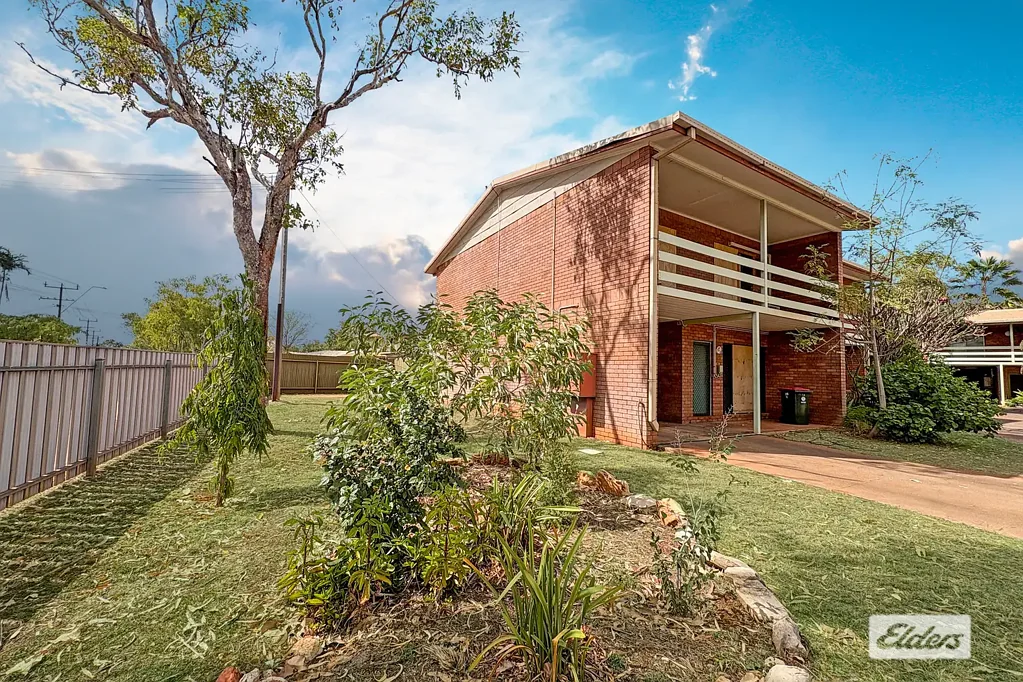 Modern 2 story townhouse with 3 bedrooms, open plan living, private courtyard, separate toilets and access to a shared complex pool.