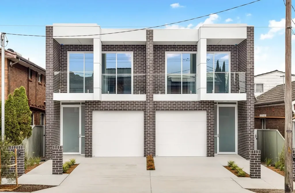 DOUBLE BRICK DUPLEX IN SOUGHT AFTER LOCATION