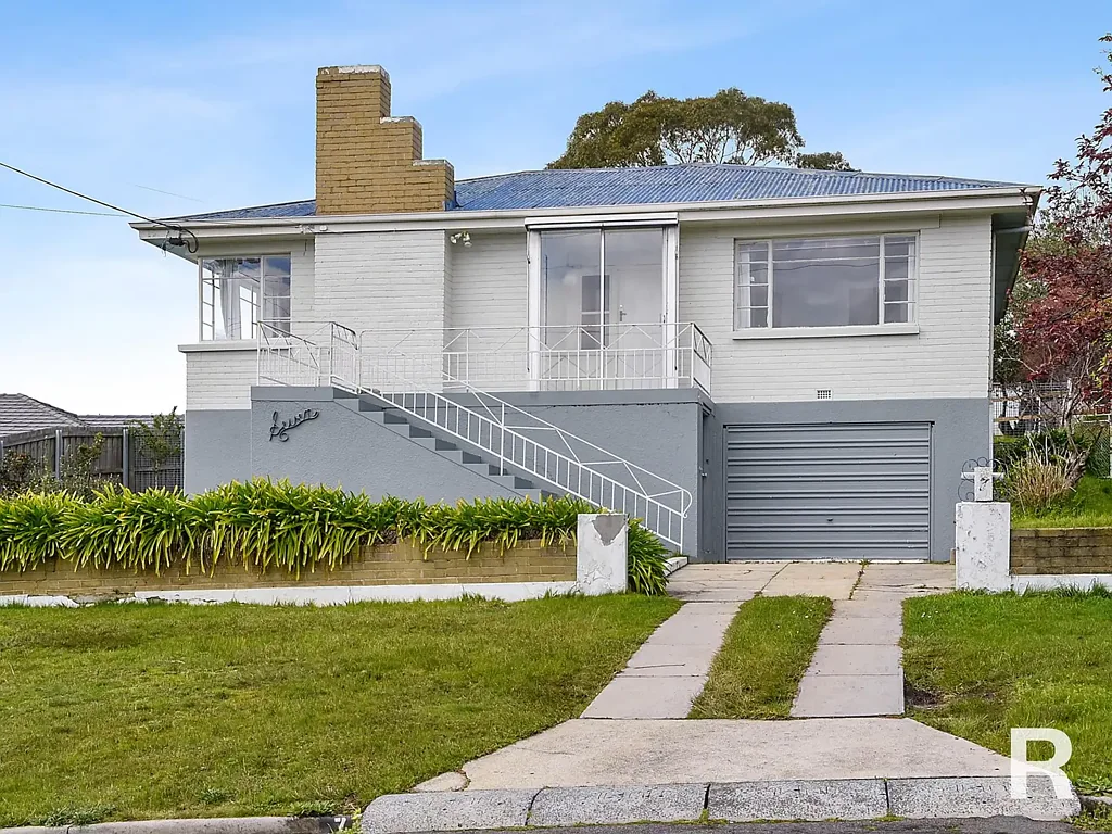 UPDATED RIVERSIDE GEM WITH STUNNING VIEWS & MODERN COMFORTS