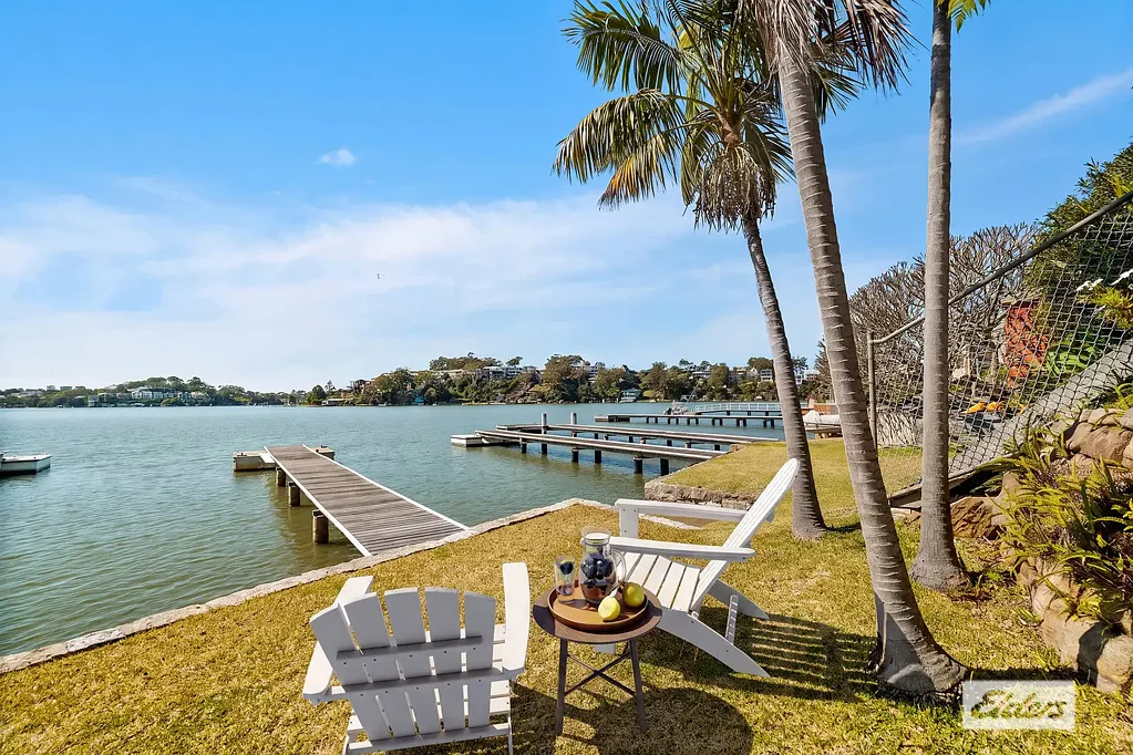 Waterfront with jetty, pontoon, boatshed and slipway