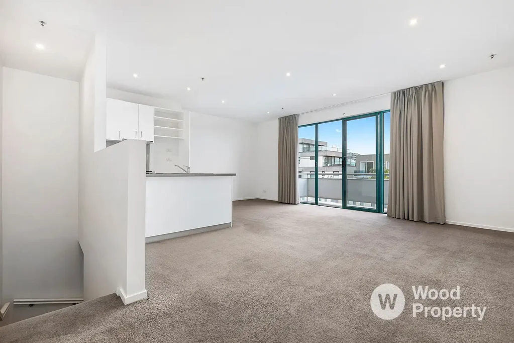 Bright Two-Story Townhouse with Balcony & Bay Views in Prime St Kilda Location