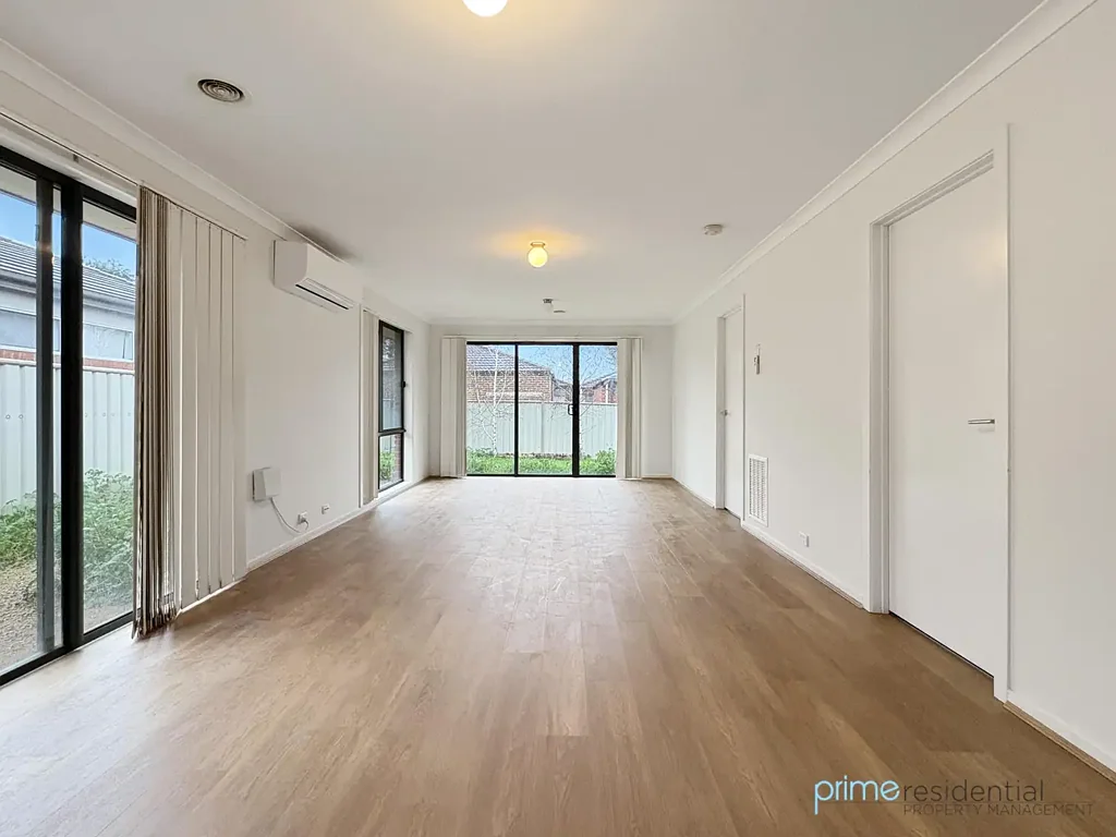 Modern Four-Bedroom Family Home with Spacious Backyard & Double Garage