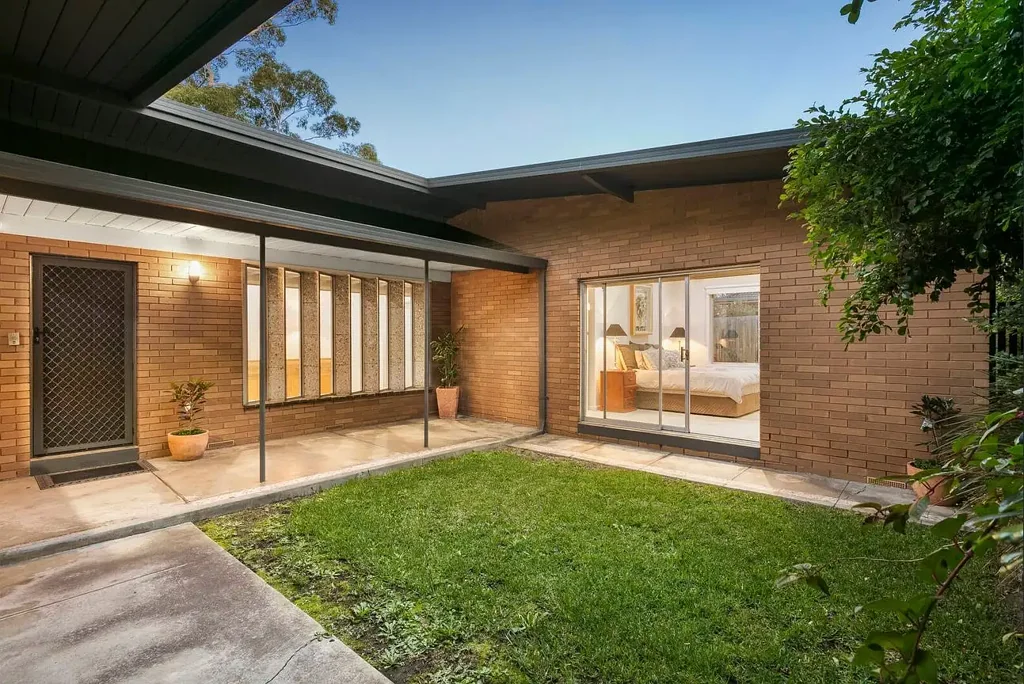 CONTEMPORARY HOME IN A CONVENIENT PARK SIDE POSITION